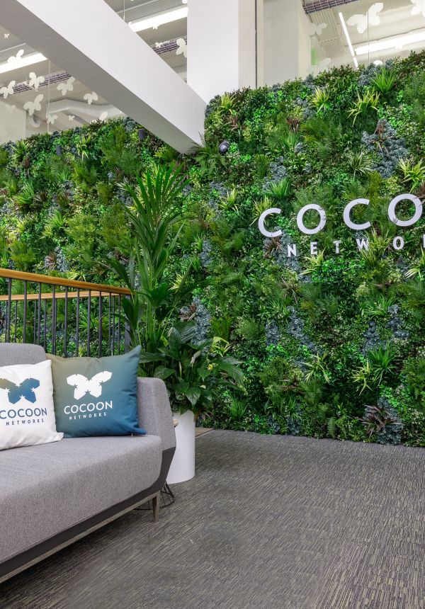 Cocoon Network Lobby with vertical permanent Vertical Green Wall Design