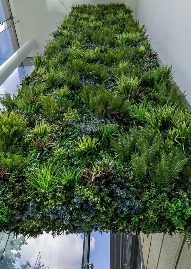 Focal wall design with Vertical Artificial Green Wall at office entrance