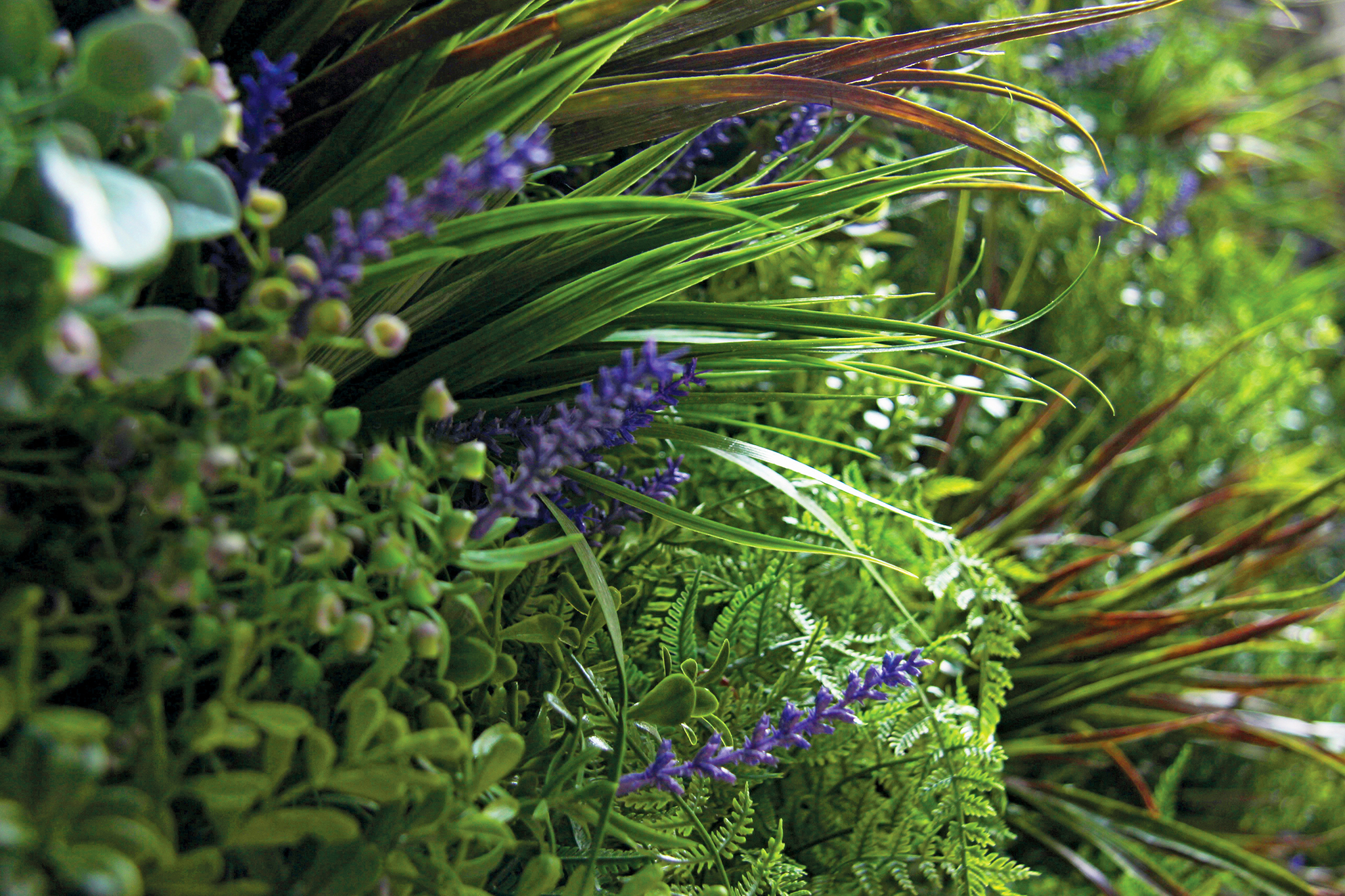 Quality Artificial foliage and flowers on Vertical Wall 